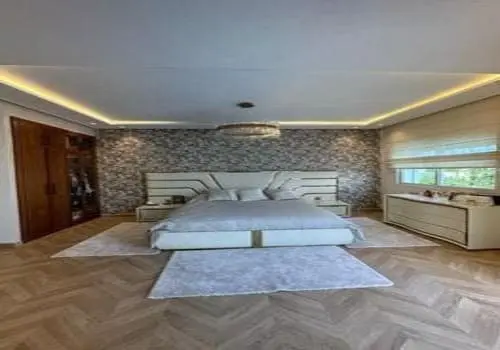 Vente-Luxueuse-Villa-450m²-avec-jardin-et-piscine