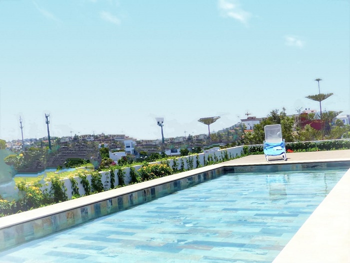 Appartement avec piscine sur oasis en location